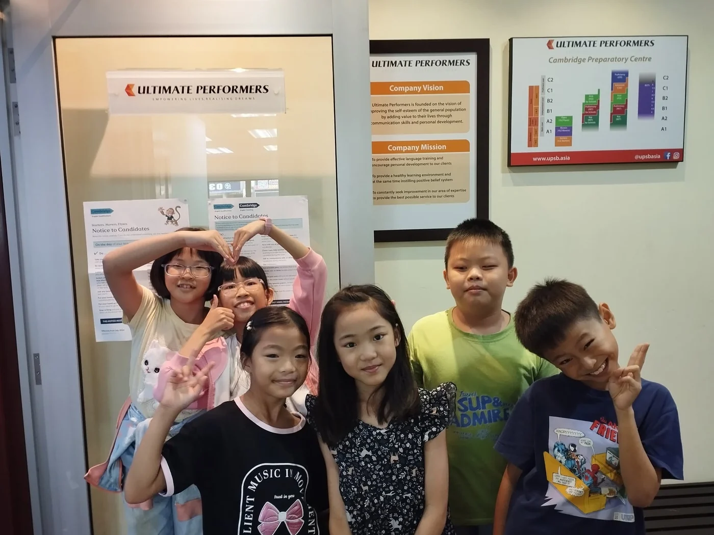 a happy young learner in class, or a proud student with a Cambridge certificate